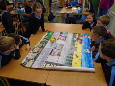 Senior Infants working with Bee-Bots